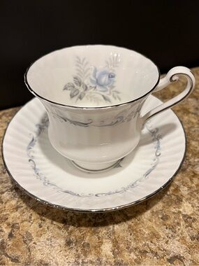 PARAGON Morning Rose Bone China Teacup and Saucer with Blue Rose and Silver Trim